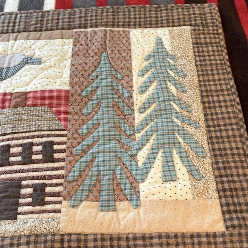 Handmade quilt wall hanging.